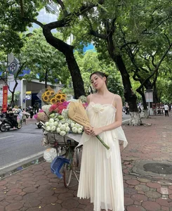Miss Vietnam Tieu Vy Steals the Spotlight with Bold Wedding Guest Fashion - image 6