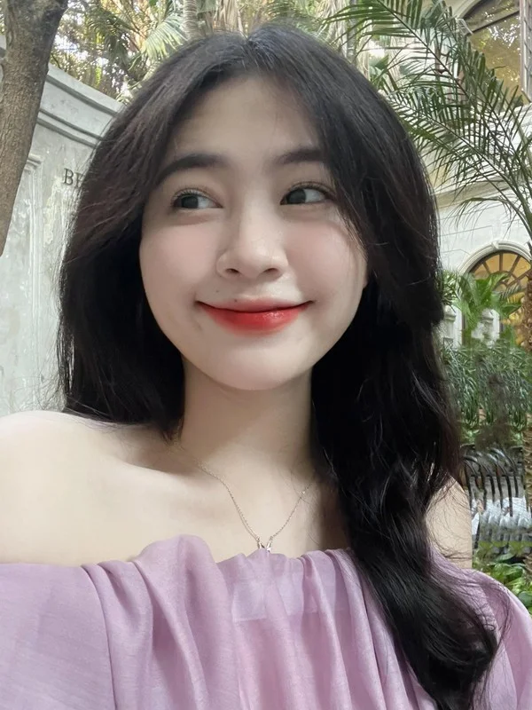 Radiant Beauty and Sun-Kissed Smiles: The Captivating Charm of Vietnam's Martial Arts Land Influencer