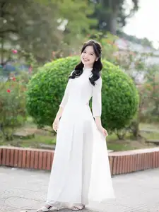Discover the Timeless Charm of a Vietnamese Girl in Elegant White Ao Dai - image 9