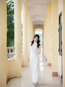 Discover the Timeless Charm of a Vietnamese Girl in Elegant White Ao Dai - image 8