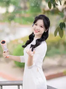 Discover the Timeless Charm of a Vietnamese Girl in Elegant White Ao Dai - image 4