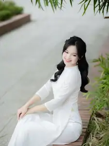 Discover the Timeless Charm of a Vietnamese Girl in Elegant White Ao Dai - image 7