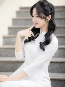 Discover the Timeless Charm of a Vietnamese Girl in Elegant White Ao Dai - image 1