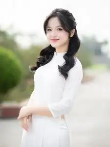 Discover the Timeless Charm of a Vietnamese Girl in Elegant White Ao Dai - image 2