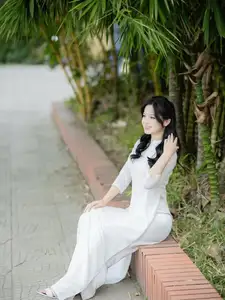 Discover the Timeless Charm of a Vietnamese Girl in Elegant White Ao Dai - image 0