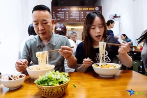 Hanoi's Famous Bun Rieu Hang Luoc Packed with Customers After Viral Criticism - image 9