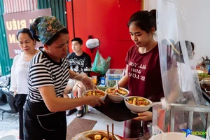 Hanoi's Famous Bun Rieu Hang Luoc Packed with Customers After Viral Criticism - image 8
