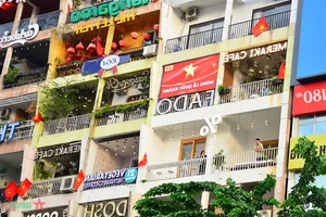 Ho Chi Minh City Streets Glow with Vibrant Colors on National Day - image 16