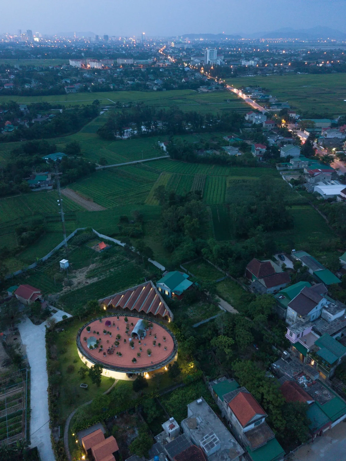 V4 House in Nghe An: A Contemporary Elliptical Garden Home Inspired by Tradition