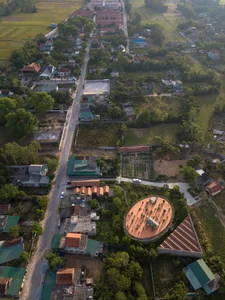 V4 House in Nghe An: A Contemporary Elliptical Garden Home Inspired by Tradition - image 4