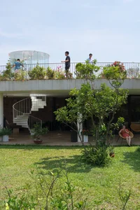 V4 House in Nghe An: A Contemporary Elliptical Garden Home Inspired by Tradition - image 2