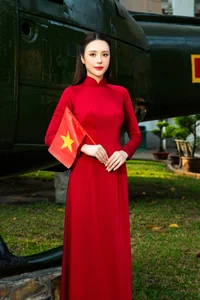 Vietnamese Pageant Queens Celebrate Reunification Day in Traditional Red Ao Dai - image 14