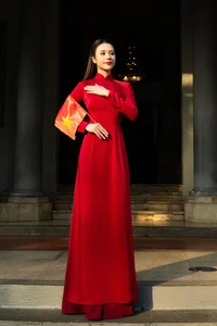 Vietnamese Pageant Queens Celebrate Reunification Day in Traditional Red Ao Dai - image 3