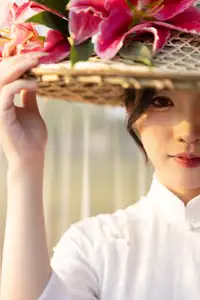 Discover the captivating grace of a Vietnamese woman in a flowing white Ao Dai and traditional conical hat - image 8