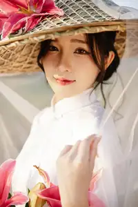 Discover the captivating grace of a Vietnamese woman in a flowing white Ao Dai and traditional conical hat - image 17