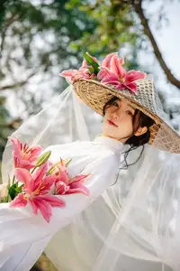 Discover the captivating grace of a Vietnamese woman in a flowing white Ao Dai and traditional conical hat - image 20