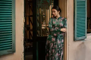Elegant Asian Beauty: Serene Woman in Modernized Traditional Dress with Vintage Floral Vase - image 14