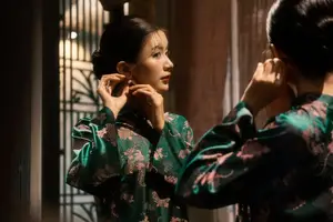 Elegant Asian Beauty: Serene Woman in Modernized Traditional Dress with Vintage Floral Vase - image 13