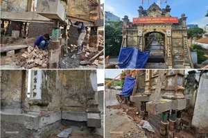 Hanoi Century Old Village Gate Lifted by Hydraulic Jacks - image 2