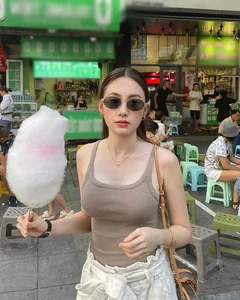 Laos' Top Influencer Turns Heads with Stunning Street Style Photos in Hanoi - image 3