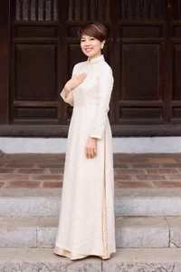 Traditional Elegance: Designer Ngoc Lan’s Ao Dai Collection Inspired by the Nine Dynastic Urns - image 5