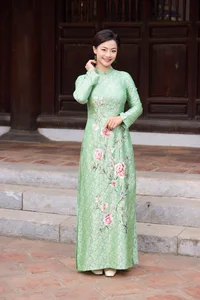Traditional Elegance: Designer Ngoc Lan’s Ao Dai Collection Inspired by the Nine Dynastic Urns - image 3