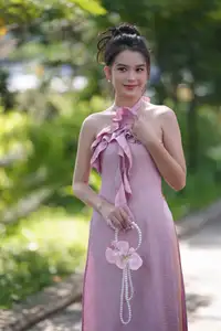 Gentle Charm: A Girl in an Elegant Pink Dress Amidst Nature's Embrace - image 10
