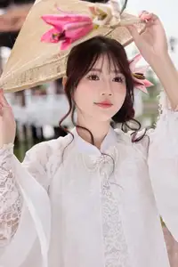 Elegant White Ao Dai with Pink Lotus Flower Embracing Cultural Heritage - image 12