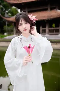 Elegant White Ao Dai with Pink Lotus Flower Embracing Cultural Heritage - image 7
