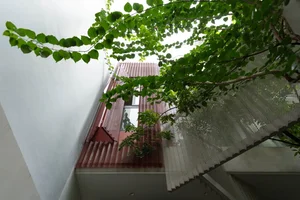 Modern Townhouse Design: Creating Unique Living Spaces with Innovative Breathing Architectural Voids - image 4