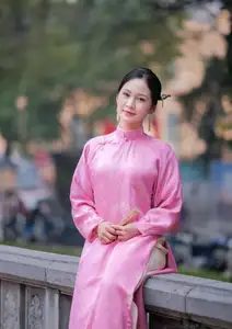Discover the Graceful Beauty of a Vietnamese Girl in Traditional Pink Ao Dai 1000028168 - image 3