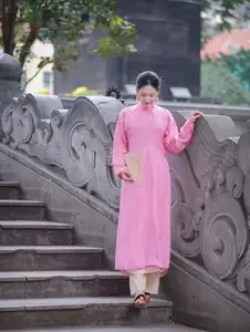 Discover the Graceful Beauty of a Vietnamese Girl in Traditional Pink Ao Dai 1000028168 - image 4