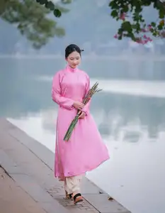Discover the Graceful Beauty of a Vietnamese Girl in Traditional Pink Ao Dai 1000028168 - image 0