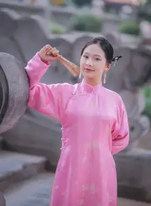 Discover the Graceful Beauty of a Vietnamese Girl in Traditional Pink Ao Dai 1000028168 - image 6