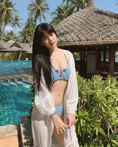 Stunning Bikini Photoshoot of Influencer Bao Han Helia: A Visual Gallery of Summer Style - image 17