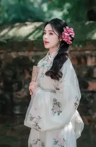 Discover the ethereal beauty of a Vietnamese girl exuding classic charm and gentle grace captivating every gaze - image 3