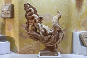 Exquisite Dragon Imagery in Ancient Artifacts Showcased in Ho Chi Minh City - image 10