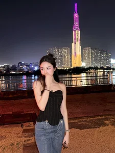 Mina Young Shines in Captivating Saigon Night Street Photoshoot - image 8