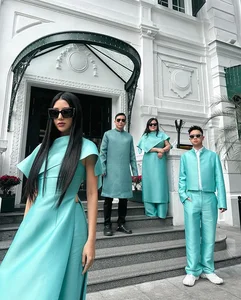 Quynh Anh Shyn Family Tet Fashion: A Stunning 7-Year Traditional Color-Themed Photoshoot Trend - image 3