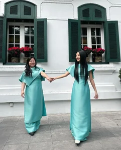 Quynh Anh Shyn Family Tet Fashion: A Stunning 7-Year Traditional Color-Themed Photoshoot Trend - image 7