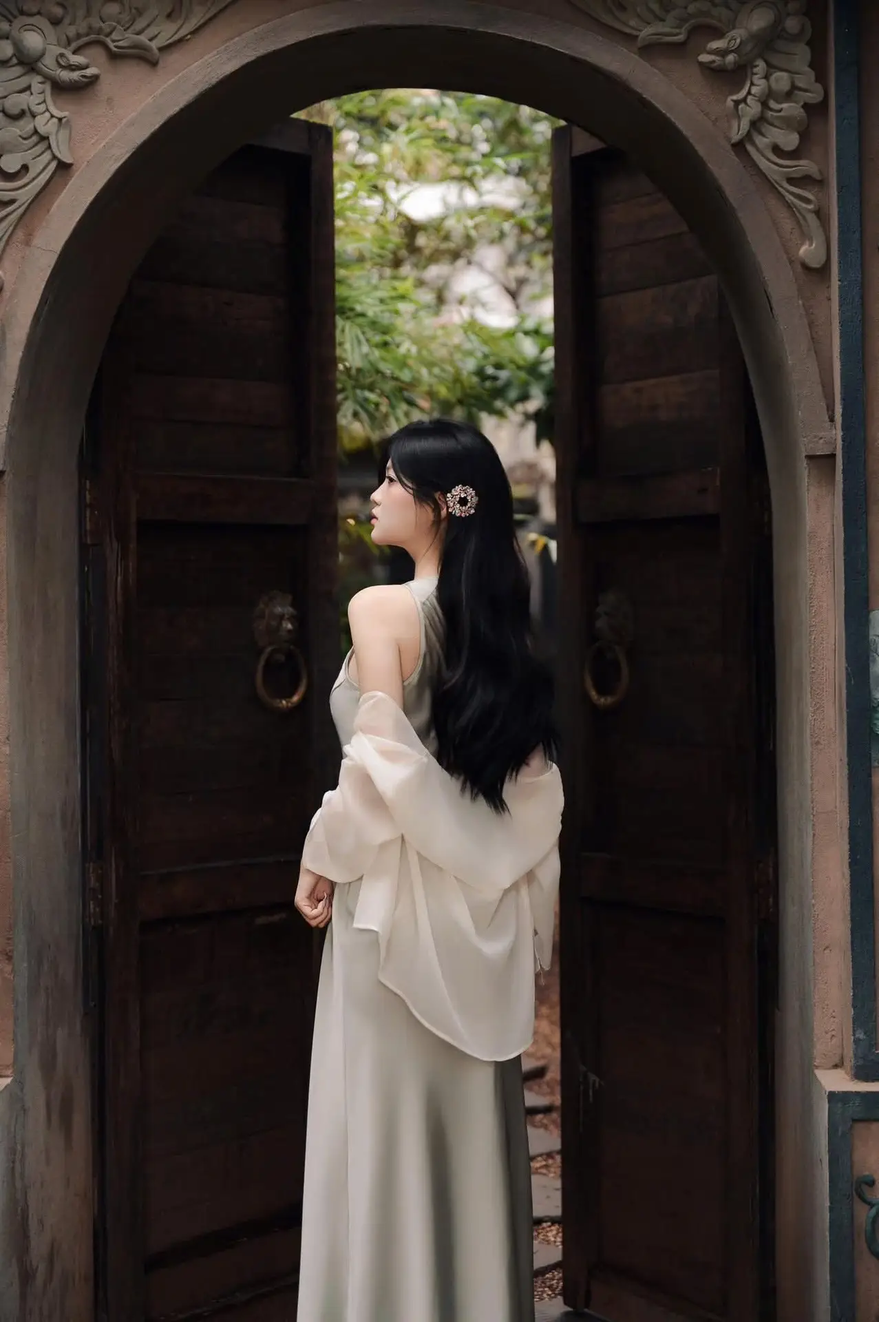 VGU No.170: Elegant Woman in Pristine White Dress Amidst Serene Garden – Capturing Timeless Grace.