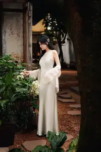 VGU No.170: Elegant Woman in Pristine White Dress Amidst Serene Garden – Capturing Timeless Grace. - image 3