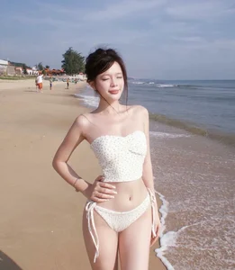 Timeless White Swimwear Trends: Beautiful Beachside Portrait Inspiration and Styling Guide - image 35