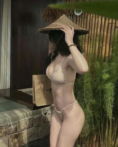 Timeless White Swimwear Trends: Beautiful Beachside Portrait Inspiration and Styling Guide - image 15