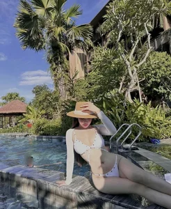 Timeless White Swimwear Trends: Beautiful Beachside Portrait Inspiration and Styling Guide - image 42