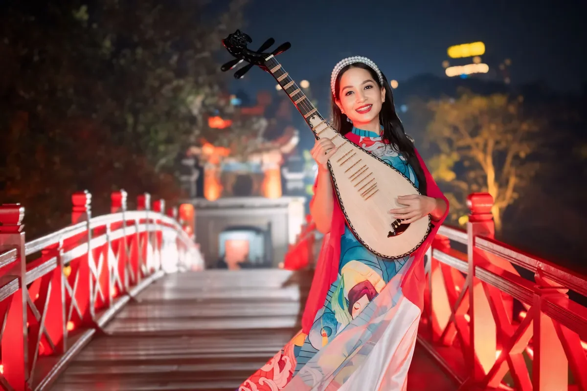 Pipa Artist Vu Dieu Thao Transforms Into Co Doi Thuong Ngan for Tet MV