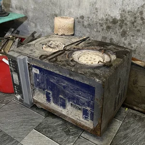 Creative Senior Citizen Goes Viral for Repurposing Old Microwaves and TVs - image 3