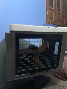 Creative Senior Citizen Goes Viral for Repurposing Old Microwaves and TVs - image 12