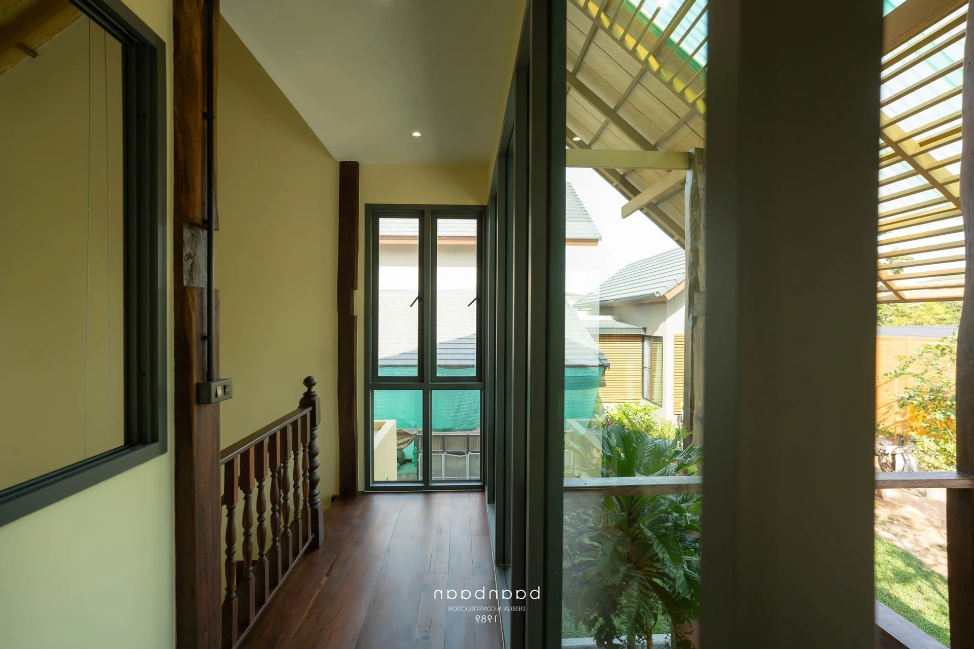 House L~M: Innovative Two-Story Home Transformation Through Creative Roof Restructuring
