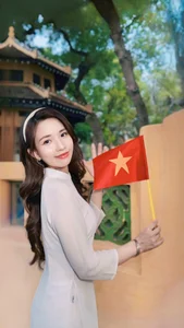 Runner-up Mivi Diem Anh Shines in Vibrant Ao Dai for Vietnam's Reunification Day - image 4